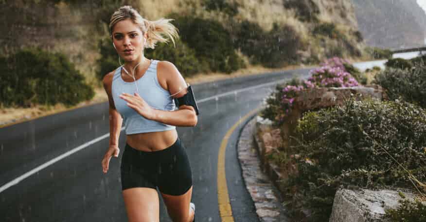 woman running on road